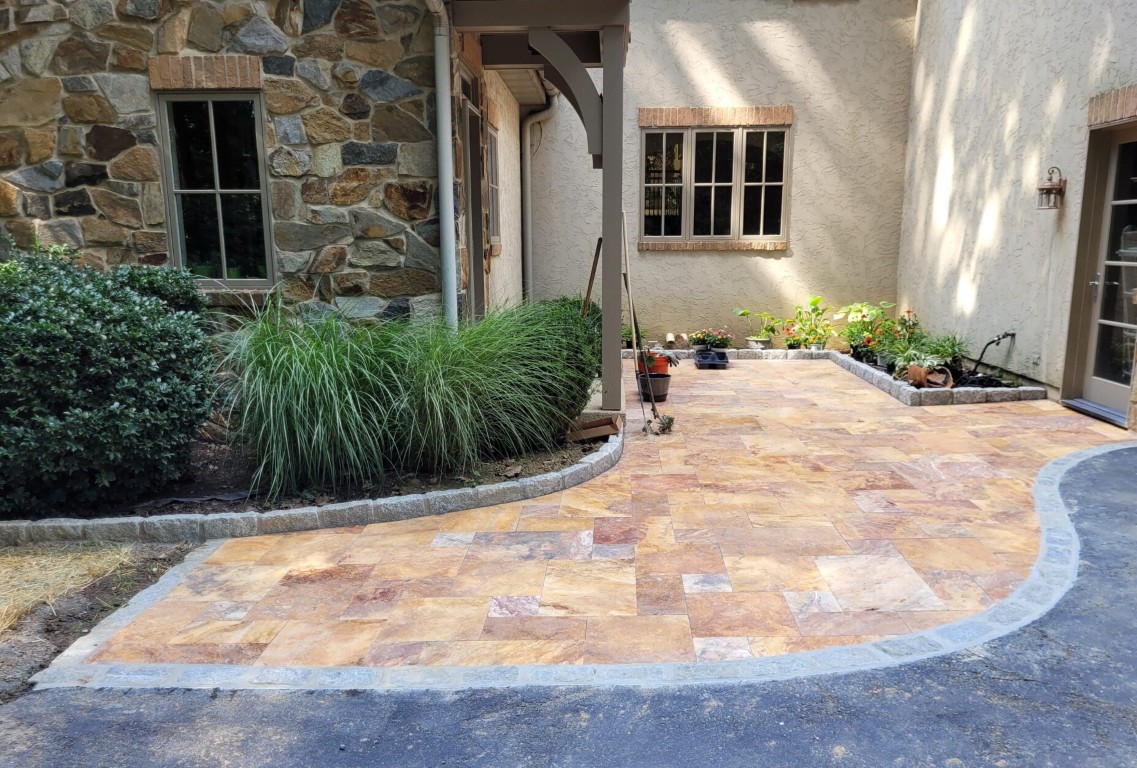 Custom stone and paver patio installation in College Station, TX
